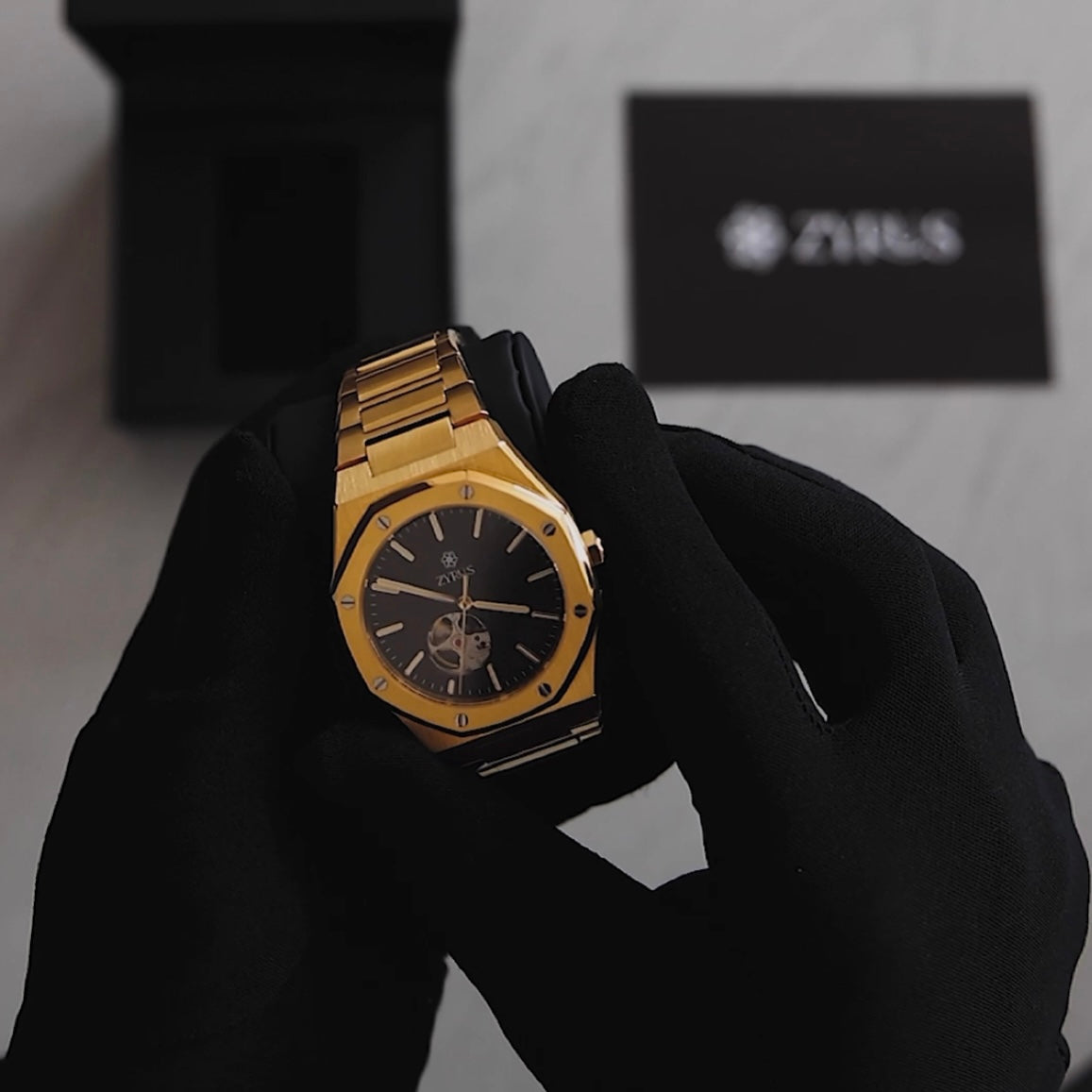 Zyrus Open Heart Watch in gold shown from all angles, highlighting its automatic movement and elegant design.