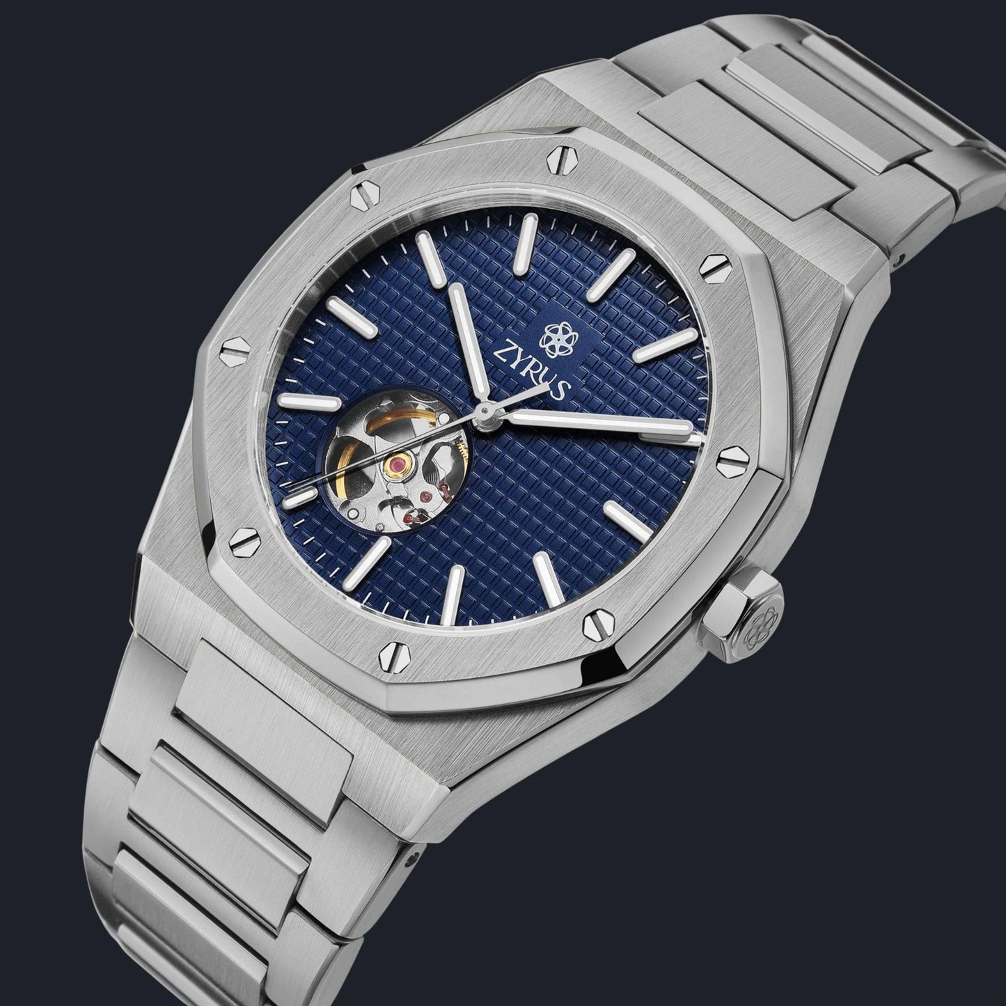 Front view of Zyrus Open Heart Watch in silver with a blue dial, showcasing its elegant design and automatic movement.